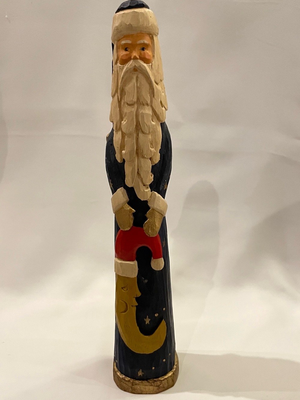Hand-Carved Santa Sculpture in Navy, Gold, Red